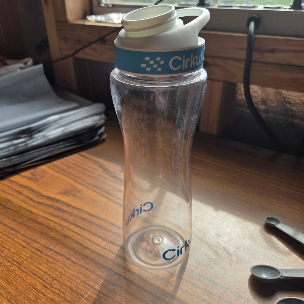 Cirkul Clear Plastic Water Bottle with White Blue Comfort Grip Lid No Sip Lid